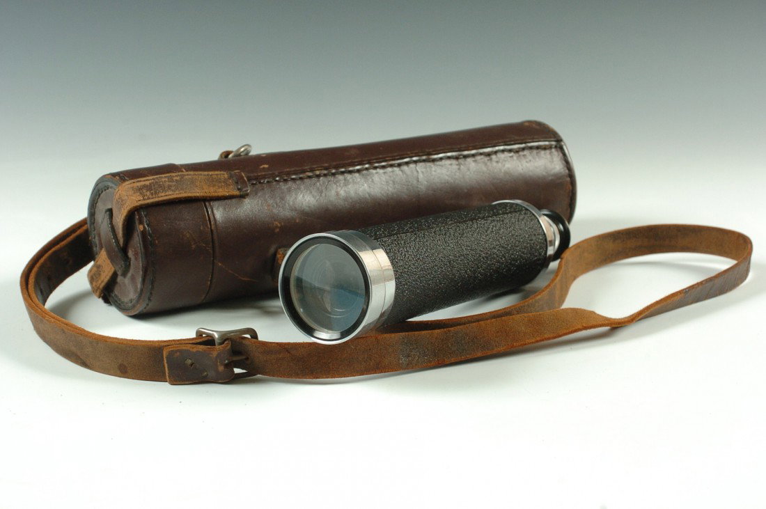 A WOLLENSAK 20 X 50 VARI-POWER TELESCOPE: A five pull telescope having a short end section with scale adjust the power 20x, 30x, 40x and 50x. Brass eye piece, chromed tubes slide very smoothly, good intact optics. Measures 32.5 inches when ex