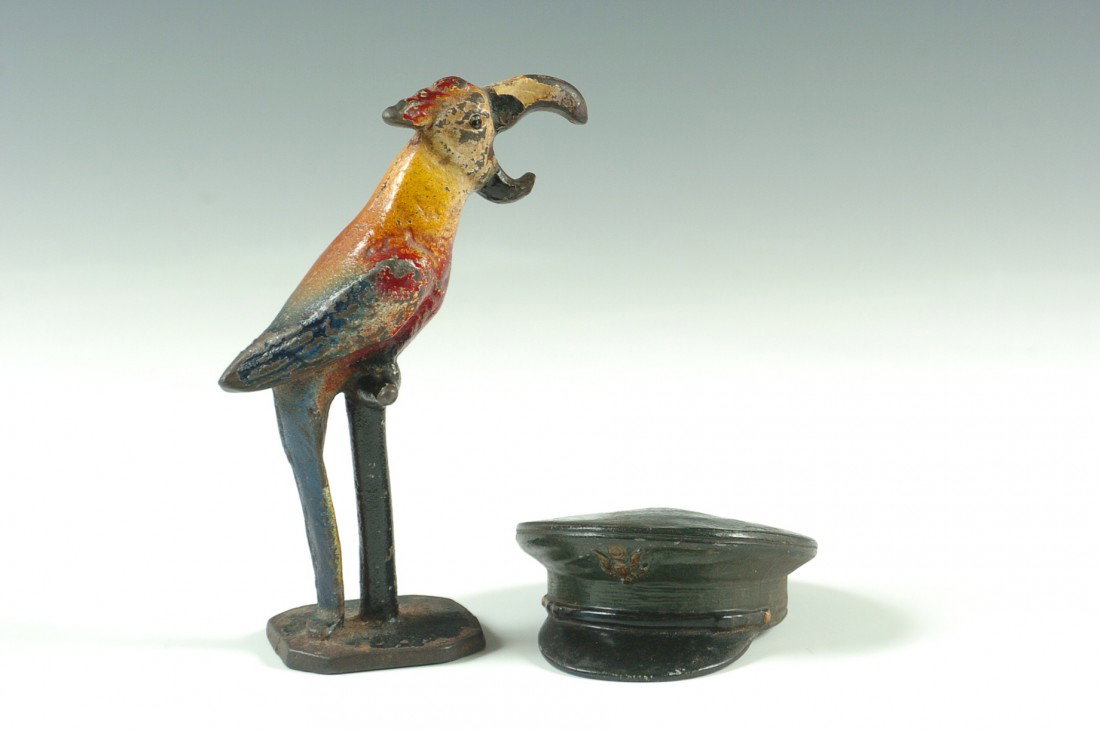 TWO VINTAGE BOTTLE OPENERS: Depicting a parrot measuring 5.5 x 4 inches and an officer's hat marked 'Fort Knox KY.' measuring 1.5 x 2.75 inches.