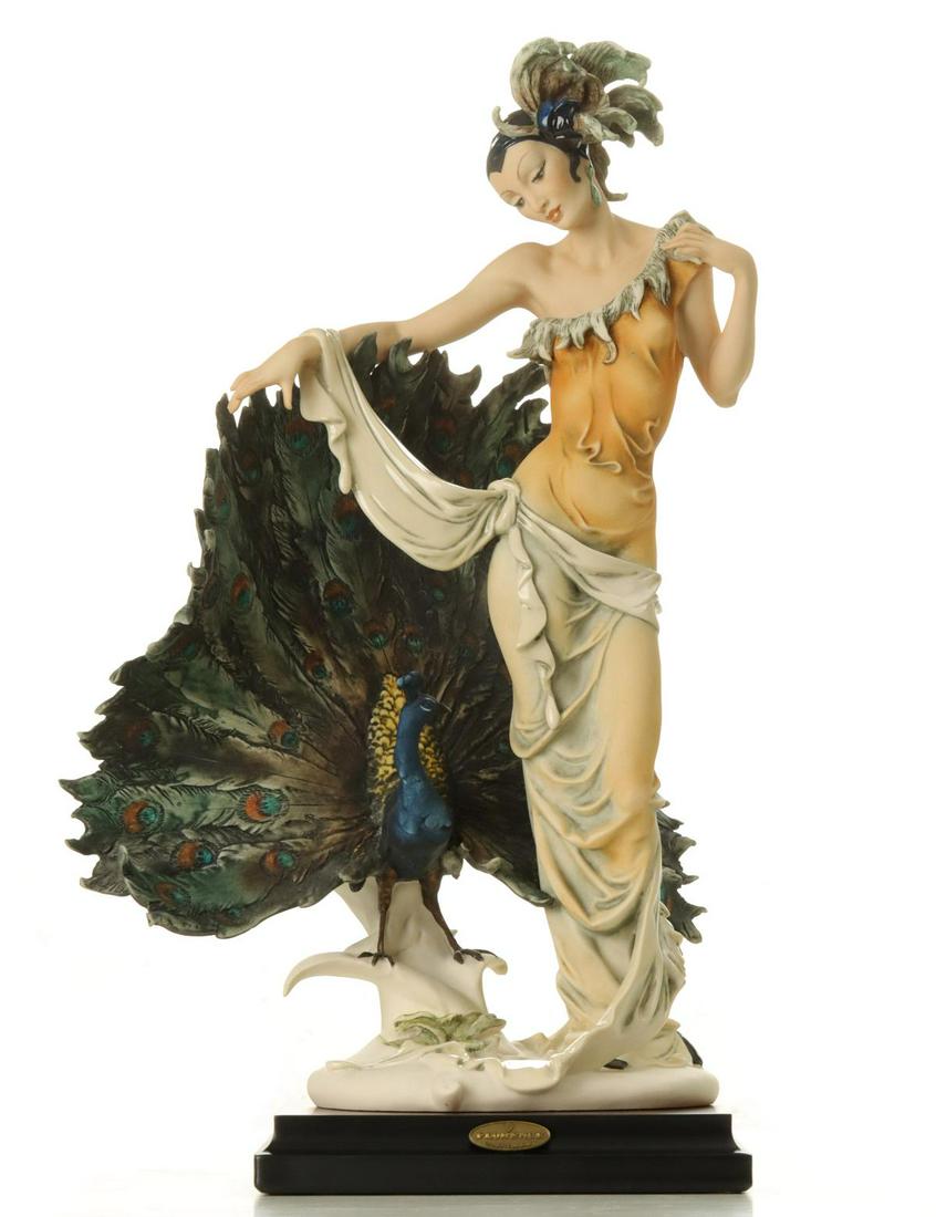 GIUSEPPE ARMANI 'ISADORA' FIGURE WITH BOX: The limited edition figure is signed near the base, numbered edition 1210/3000 and dated 1994, with original box and certificate. Measures 18.5 x 12 x 9 inches.