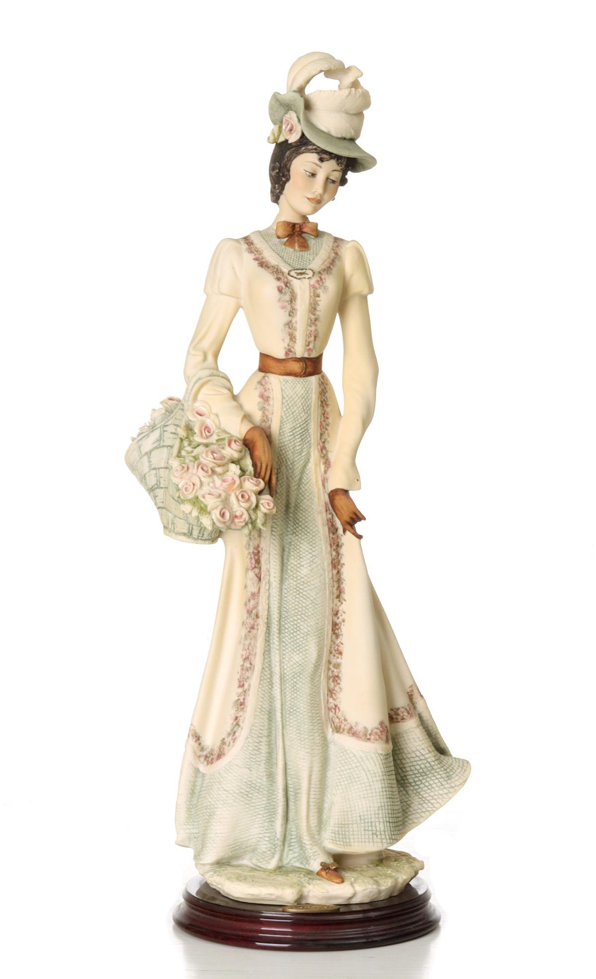 GIUSEPPE ARMANI 'FRAGRANCE' FIGURE WITH BOX: The limited edition figure is signed near the base, numbered edition 718/3000 and dated 1993, with original box and certificate. Measures 20 inches.