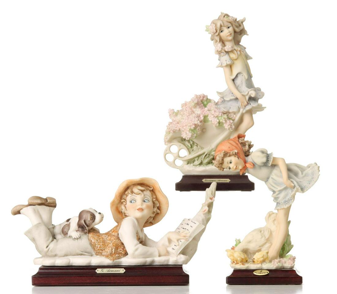 A COLLECTION OF GIUSEPPE ARMANI FIGURES WITH BOXES (1 of 18)