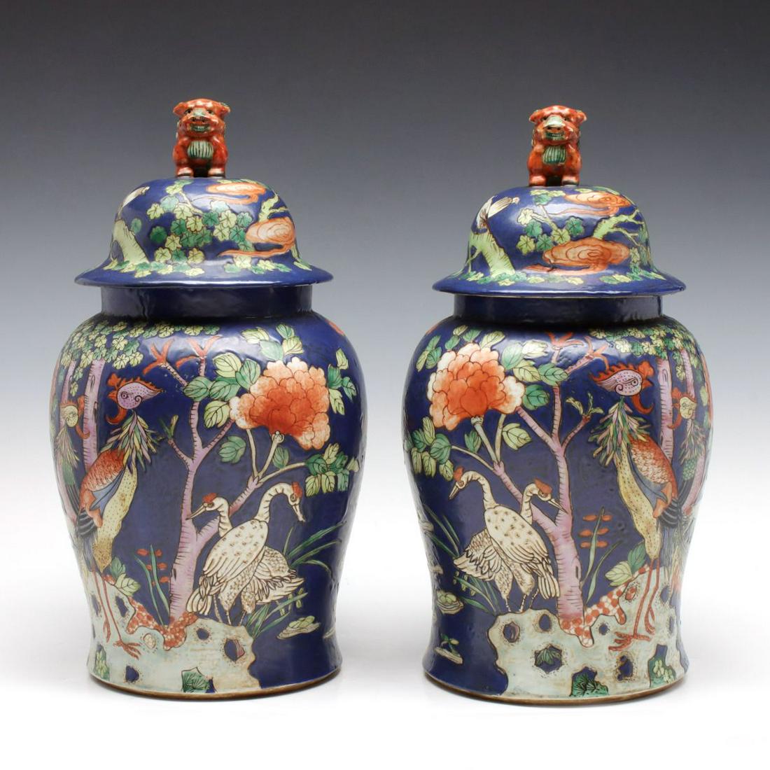 A PAIR OF LARGE 20TH CENTURY PORCELAIN GINGER JARS: The pair as shown. Each measures 20.5 x 10.25 x 10.25 inches.