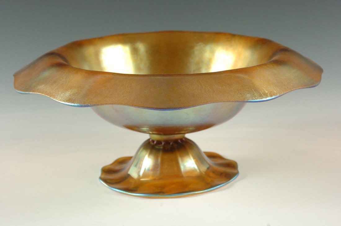 A LARGE GOLD AURENE COMPOTE ATTRIBUTED STEUBEN: Two piece construction, measures 5 h x 12.25 w inches.