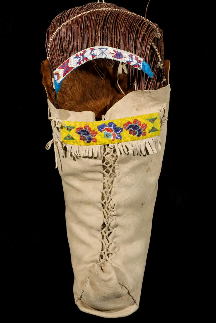 A TANNED HIDE AND BEADWORK UTE CRADLEBOARD (1 of 8)