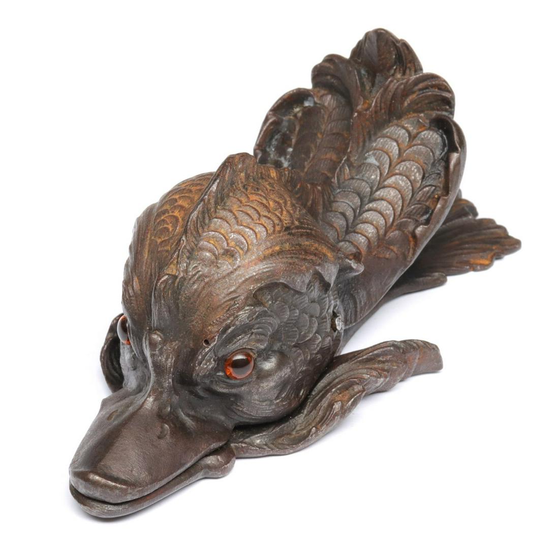 A DETAILED CAST IRON GLASS EYED DOLPHIN LETTER CLIP (1 of 13)