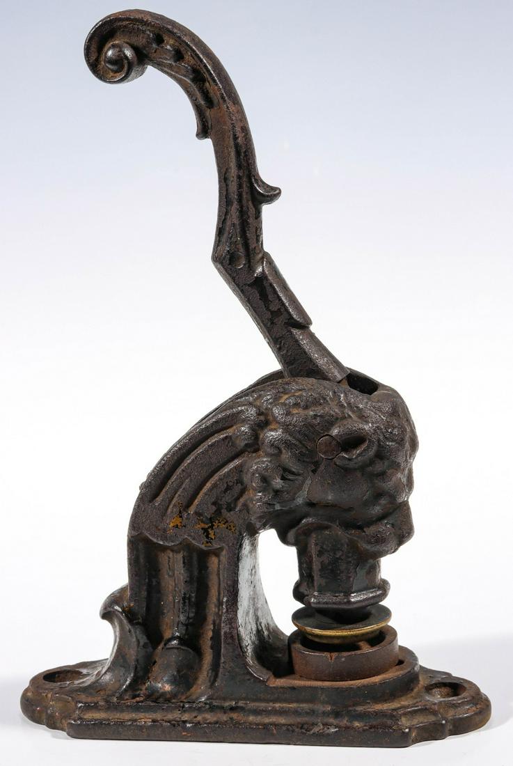 A LARGE FIGURAL LION HEAD IRON SEAL C. 1890 (1 of 9)