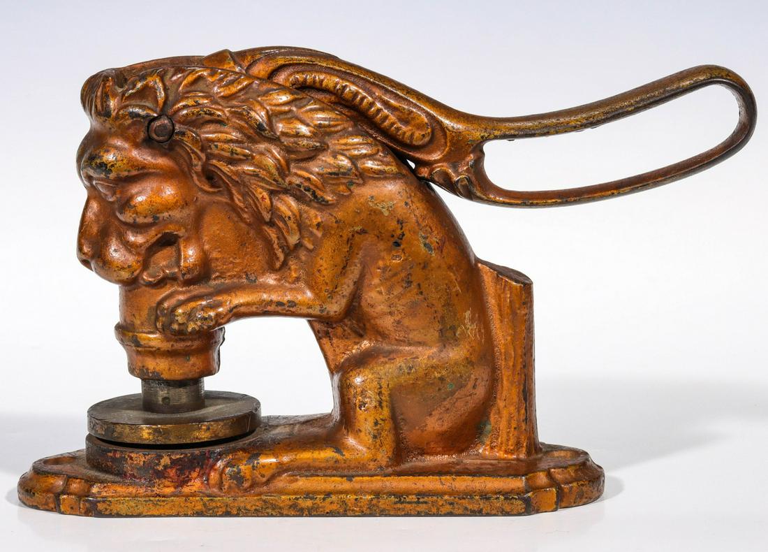 A LARGE FIGURAL SEATED LION IRON SEAL C. 1888 (1 of 10)