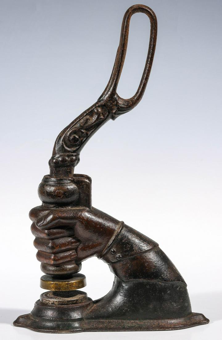 A LARGE FIGURAL CLENCHED FIST IRON SEAL C. 1890 (1 of 8)