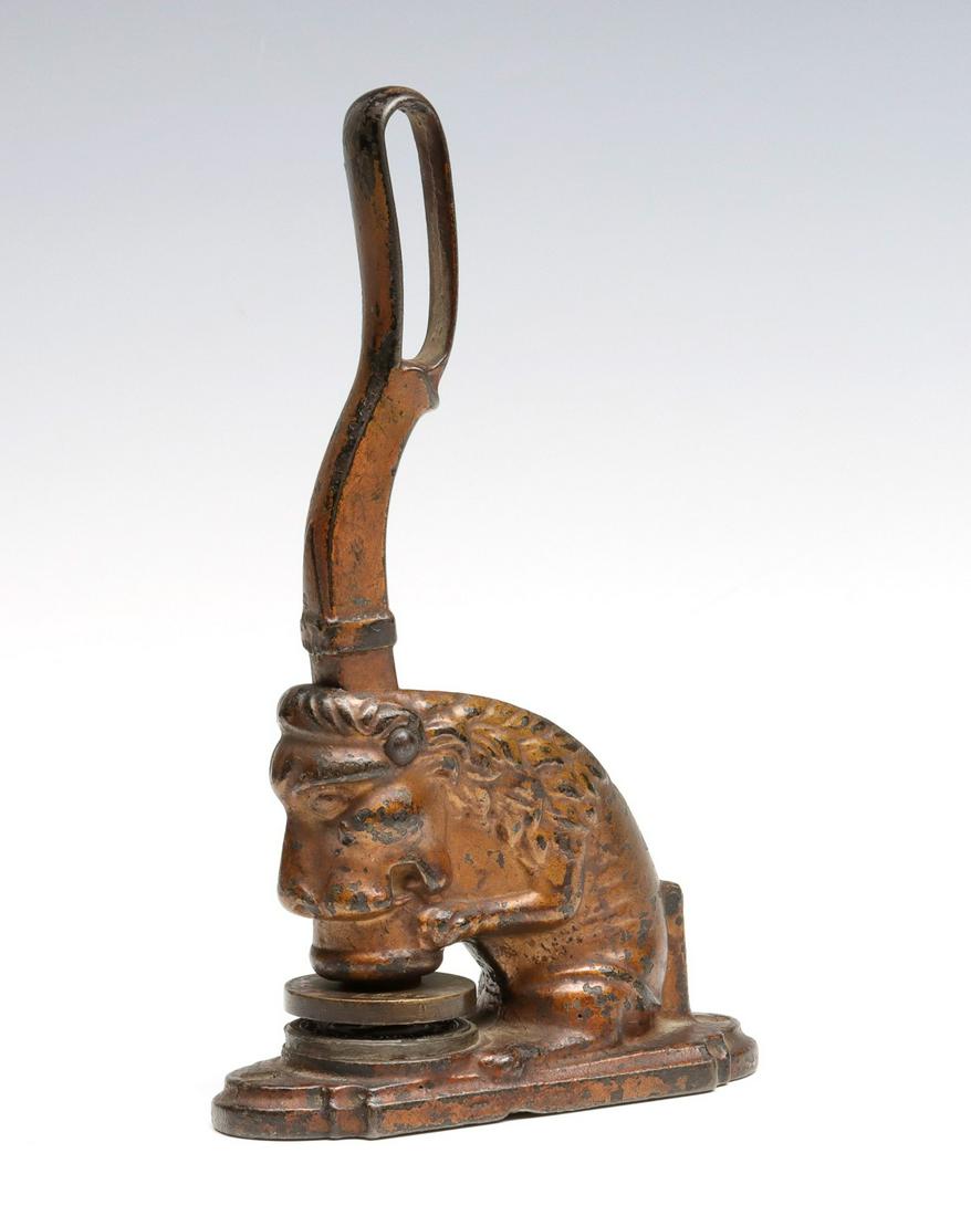 A LARGE FIGURAL SEATED LION IRON SEAL C. 1890 (1 of 8)