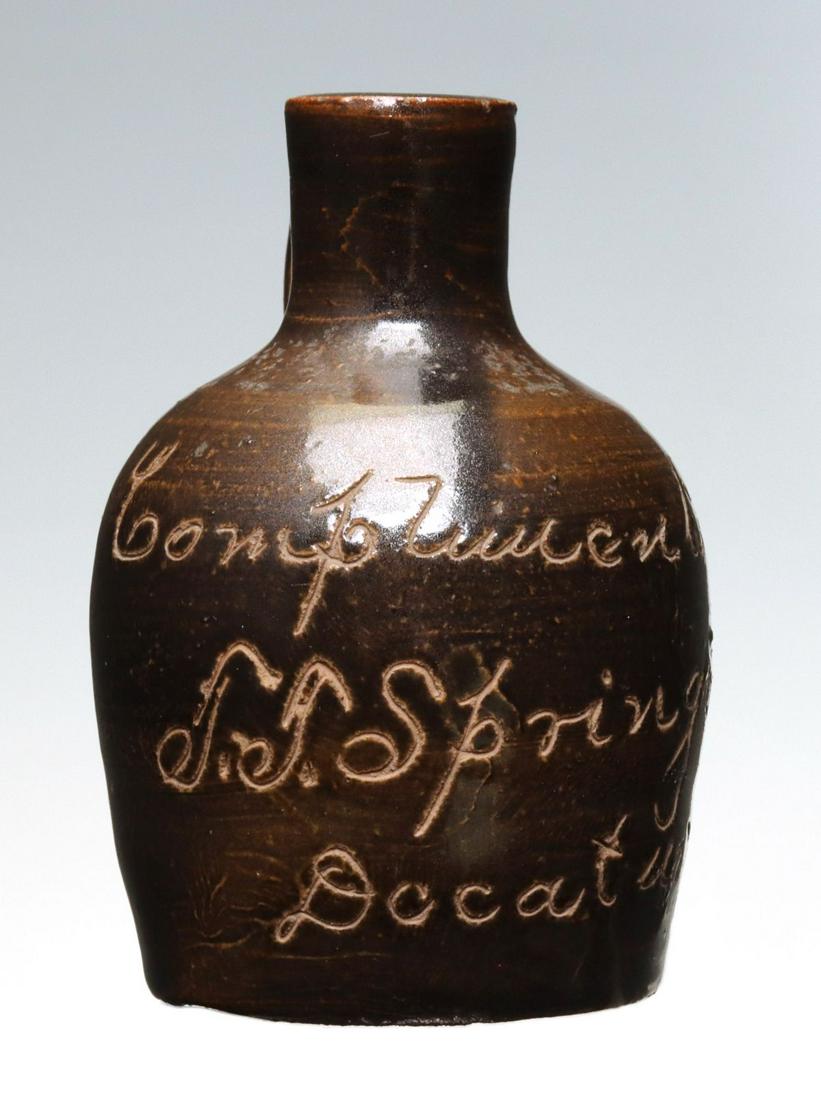 A ''DOCATUR ILLINOIS'' STONEWARE MINI JUG (1 of 9)