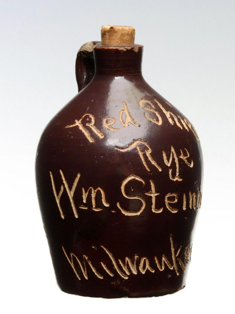 MILWAUKEE WISCONSIN STONEWARE MINI JUG (1 of 10)