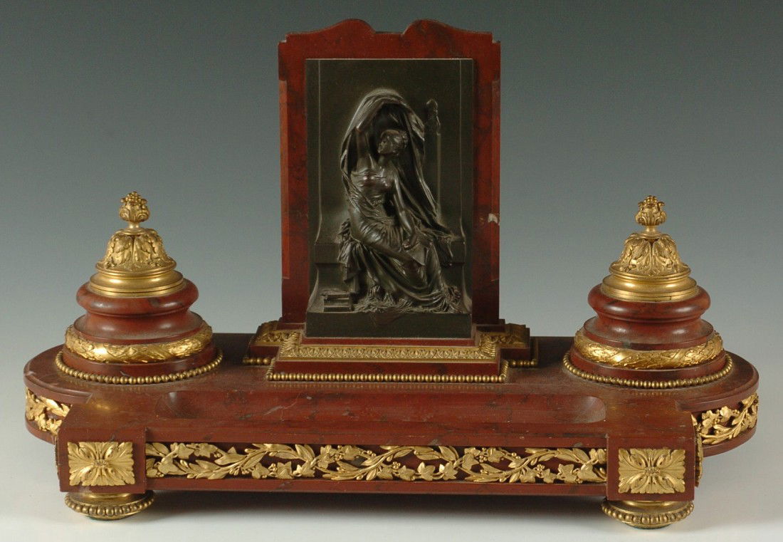 HENRI CHAPU 19TH C. MARBLE & BRONZE DORE INK STAND: A rouge marble ink stand with bronze dore mounts and a central patinated bronze rendition of 'Woman with the Sheaf' signed H. Chapu lower right for Henri Michel Antoine Chapu (1933-1891) with the foun