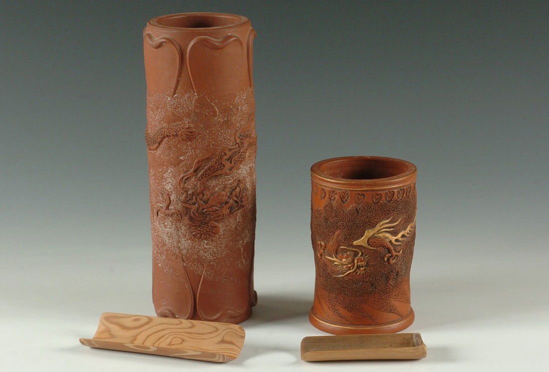 TWO CHINESE REDWARE BRUSH POTS WITH DRAGONS: Both with dragons. Larger 9.5 x 3.5 inches, smaller 5 x 3.25 inches, and with gold painted highlights.