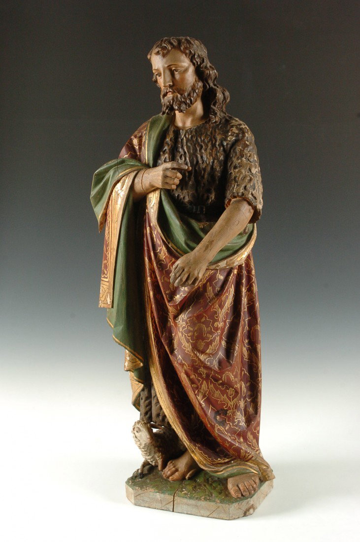 19TH C. CARVED WOOD FIGURE OF JOHN THE BAPTIST, NAZAREN: A carved and gessoed figure with original polychrome paint and original untouched gilding. The figure is 35 inches high and measures 11 x 12 inches.