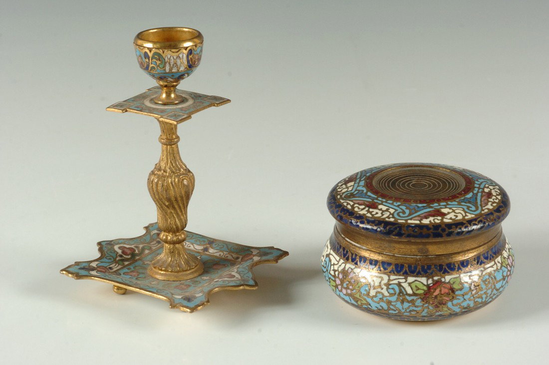 TWO GILDED BRONZE CHAMPLEVE OBJECTS: A 4.75 candlestick, a 2 x 3 inch round box.