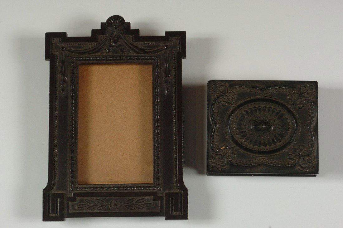 TWO GUTTA PERCHA PIECES, FRAME AND CASE: Includes a hinged case with ambrotype, 3 x 2.75 inches closed, image of mid-19th century woman. Also a 5.75 x 4 inch frame.
