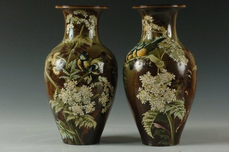 C. 1880 DOULTON FAIENCE VASES FLORENCE LEWIS, 14.5 INCH: A fine matching pair of slip painted faience vases for Doulton Lambeth signed with the monogram of Florence Lewis. Unusually large pair with elaborate decoration, the base of each marked with an impre
