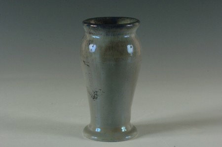 A PEWABIC ART POTTERY VASE: Grey, stands 5.5 inches, Pewabic mark on bottom, partially obscured.