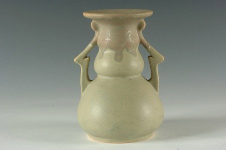 A ROSEVILLE CARNELIAN VASE: Green Carnelian vase, measures 7.5 x 6.5 inches.