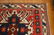 18: A 43 X 47 INCH EAGLE KAZAK PATTERN RUG - 5