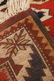 18: A 43 X 47 INCH EAGLE KAZAK PATTERN RUG - 6