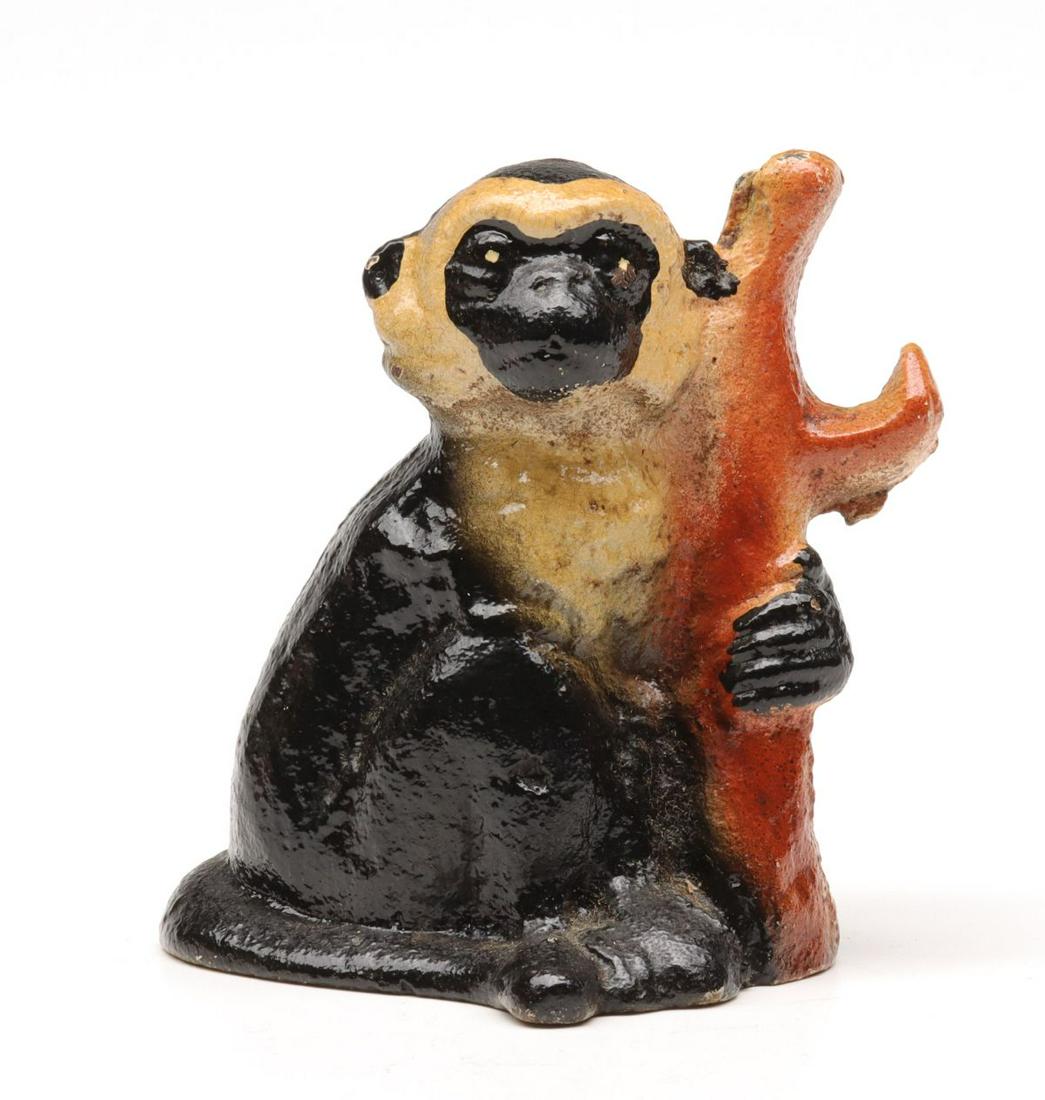 A VINTAGE FIGURAL IRON BOTTLE OPENER (1 of 9)