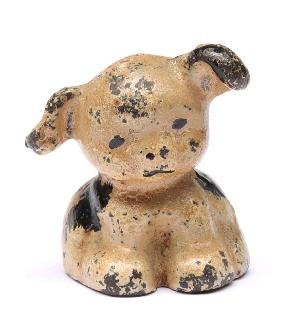 A FIGURAL PUP CAST IRON ADVERTISING PAPERWEIGHT (1 of 10)
