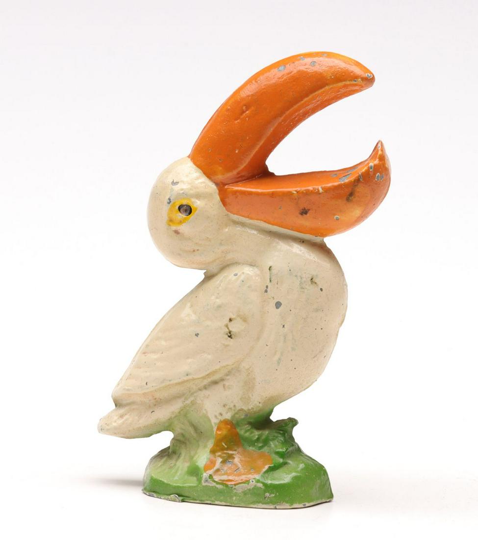 A VINTAGE FIGURAL IRON BOTTLE OPENER (1 of 10)