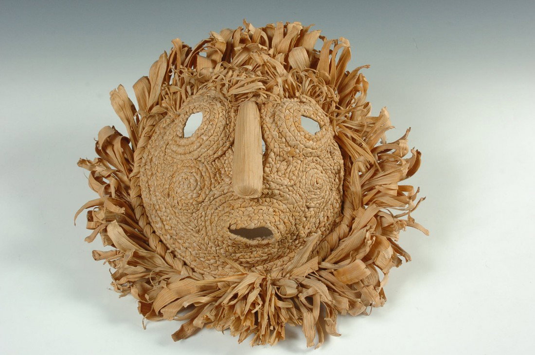 AN IROQUOIS CORN HUSK MASK: Fuzzy Head Society (cousin to False Face Society) to cure sickness, measures 14 x 13 inches