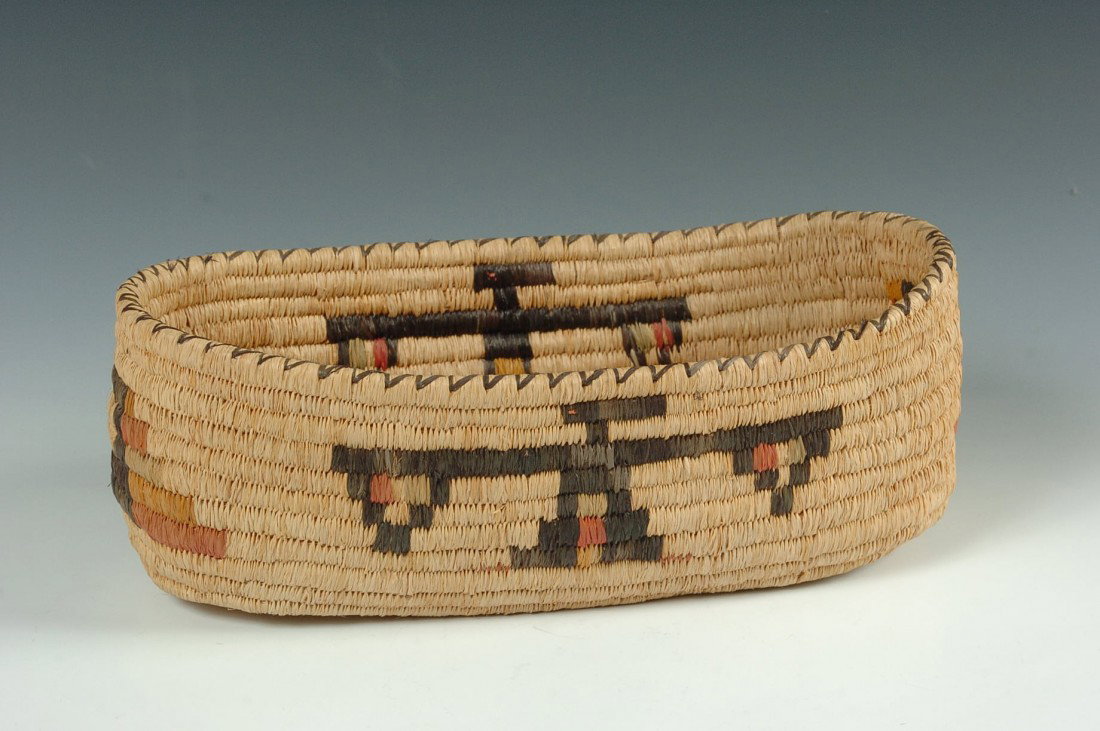 SKOKOMISH BOAT SHAPE BASKET WITH THUNDERBIRDS