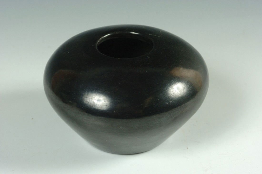 POLISHED BLACK SAN ILDEFONSO POTTERY MARIA POVEKA: Scratched signature on the polished black base, measures 3.25 x 4.75 inches. Purchased from Barbara Gonzales at Martha Pearson's shop in 1975