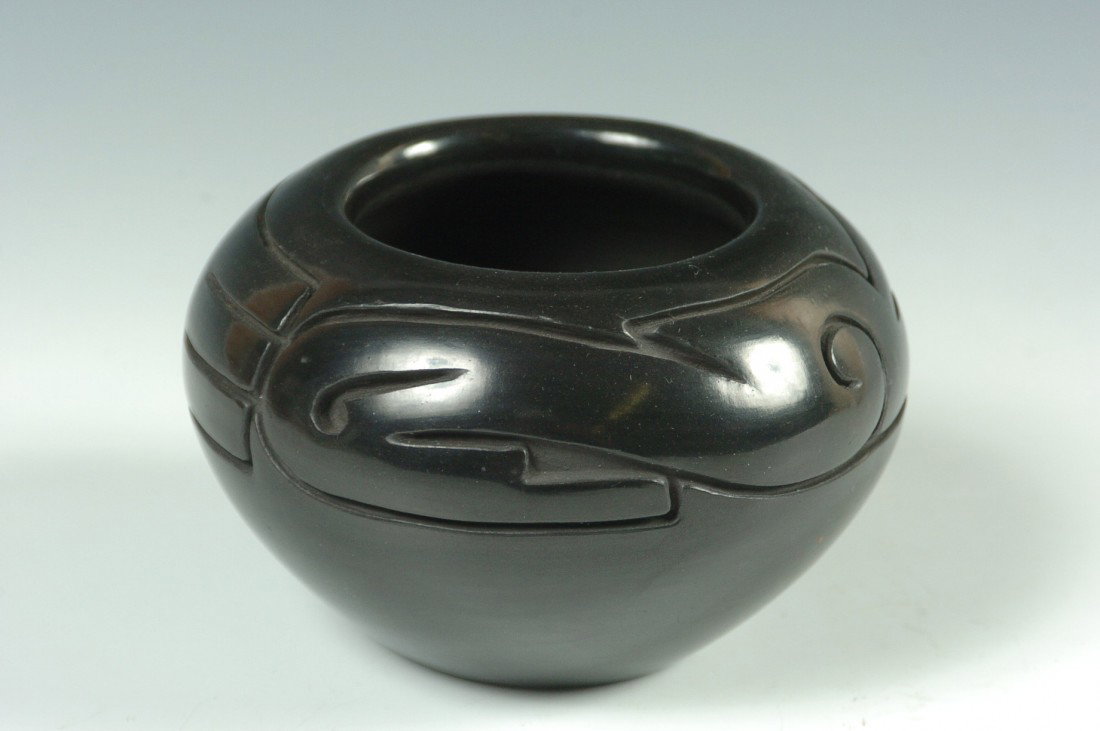 CARVED SANTA CLARA POTTERY SIGNED TONI ROLLER: Inscribed Toni Roller Santa Clara Pueblo, 6-76 #50, measures 3 x 4.25 inches, purchased 7/19/76 at the 3rd Artisans Show of the 8 Northern Pueblos at Santa Clara.