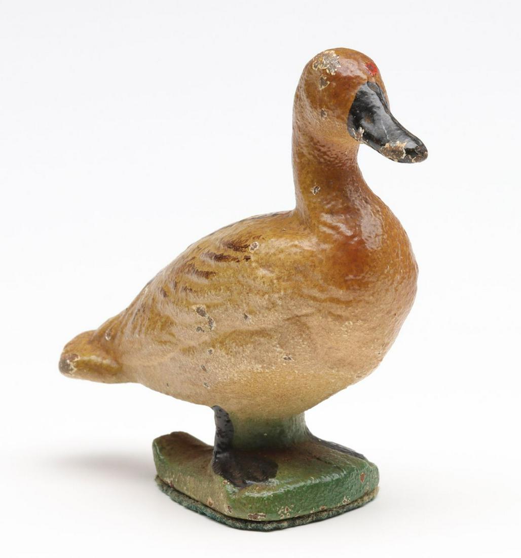 A VINTAGE FIGURAL GOOSE CAST IRON BOTTLE OPENER (1 of 9)