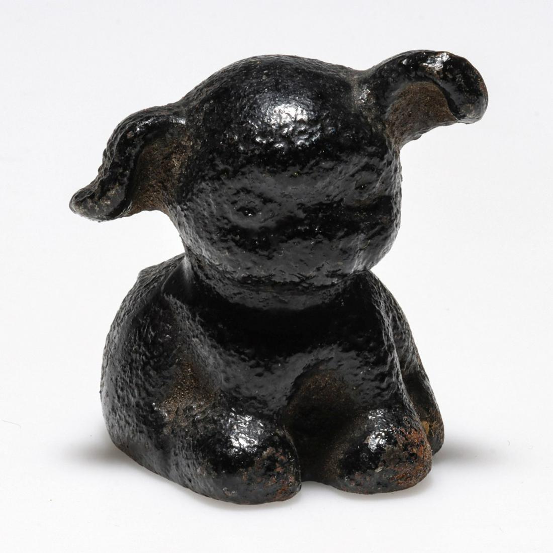 A FIGURAL PUP IRON PAPERWEIGHT LETTERED EAST TECH (1 of 5)