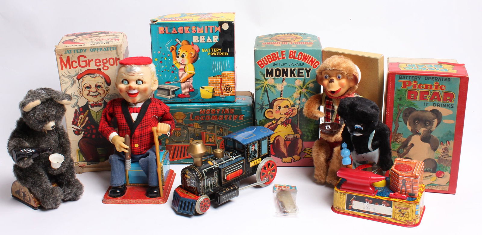 FIVE VINTAGE BATTERY OPERATED TOYS IN ORIGINAL BOX (1 of 7)