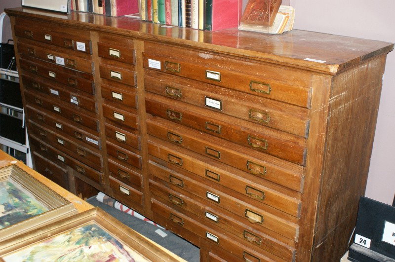 24 DRAWER CABINET: As shown, measures 46 x 85 x 18.75 inches. Case only, no contents.