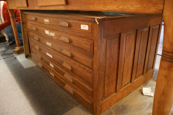 ANTIQUE OAK SIX DRAWER MAP CASE: With wood pulls, paneled sides and back. Measures 26.5 x 53.5 x 34.5 inches. Case only, no contents.