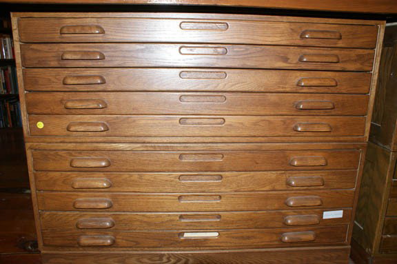 TEN DRAWER OAK MAP CASE: With wood pulls, two stacked sections, measures 33.5 x 41 x 42 inches. Case only, no contents.