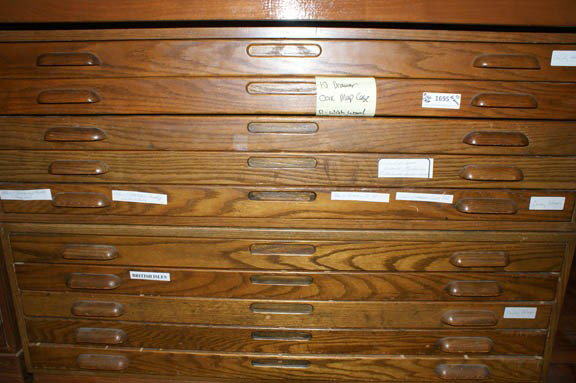 TEN DRAWER OAK MAP CASE: With wood pulls, two stacked sections, measures 33.5 x 41 x 42 inches. Case only, no contents.