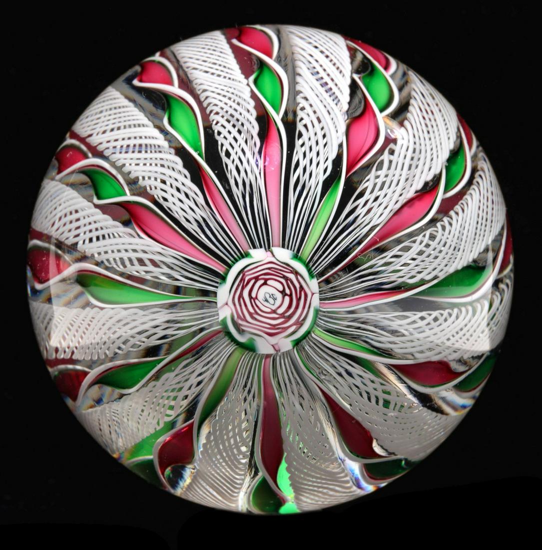 BILL BURCHFELD CHRISTMAS CROWN WITH CLICHY-STYLE CANE: Bill Burchfield Christmas crown paperweight featuring red, white and green twisted canes interspersed with white latticinio canes and crowned at the top with his iconic complex Clichy-style rose cane 