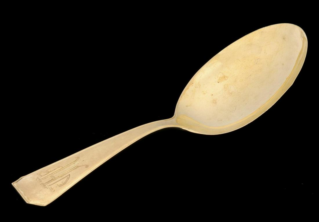 A SOLID 14K GOLD CHILD'S FEEDING SPOON DATED 1930 (1 of 5)