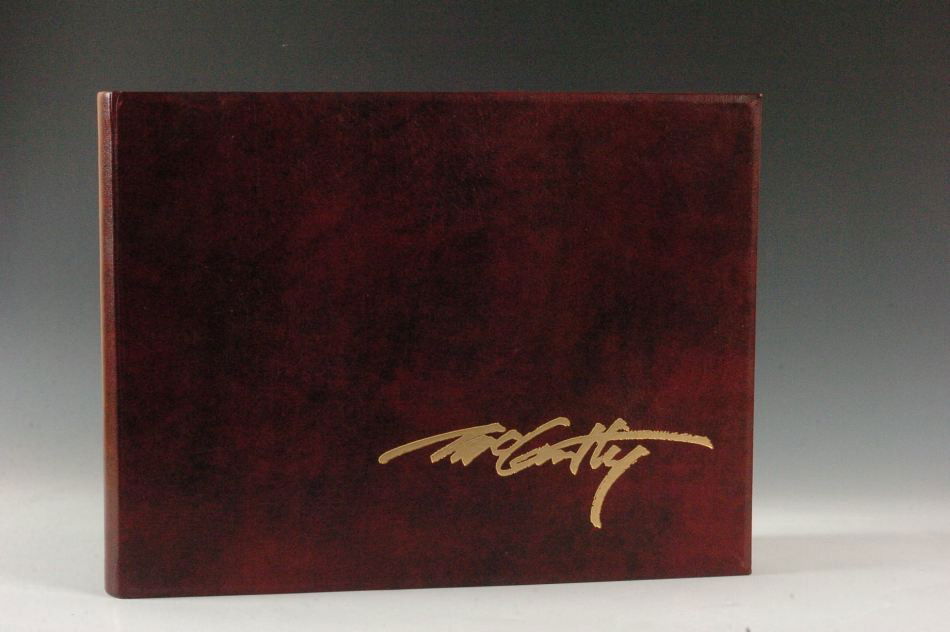 MCCARTHY, F.C., 'THE OLD WEST: A PORTRAIT IN PAINTINGS': Massive long format coffee table book with hardshell book-form box. With foreword by Louis L'Amour and introduction by Elmer Kelton. Signed edition, hand numbered 32/1500. Does not have the 'Crossing