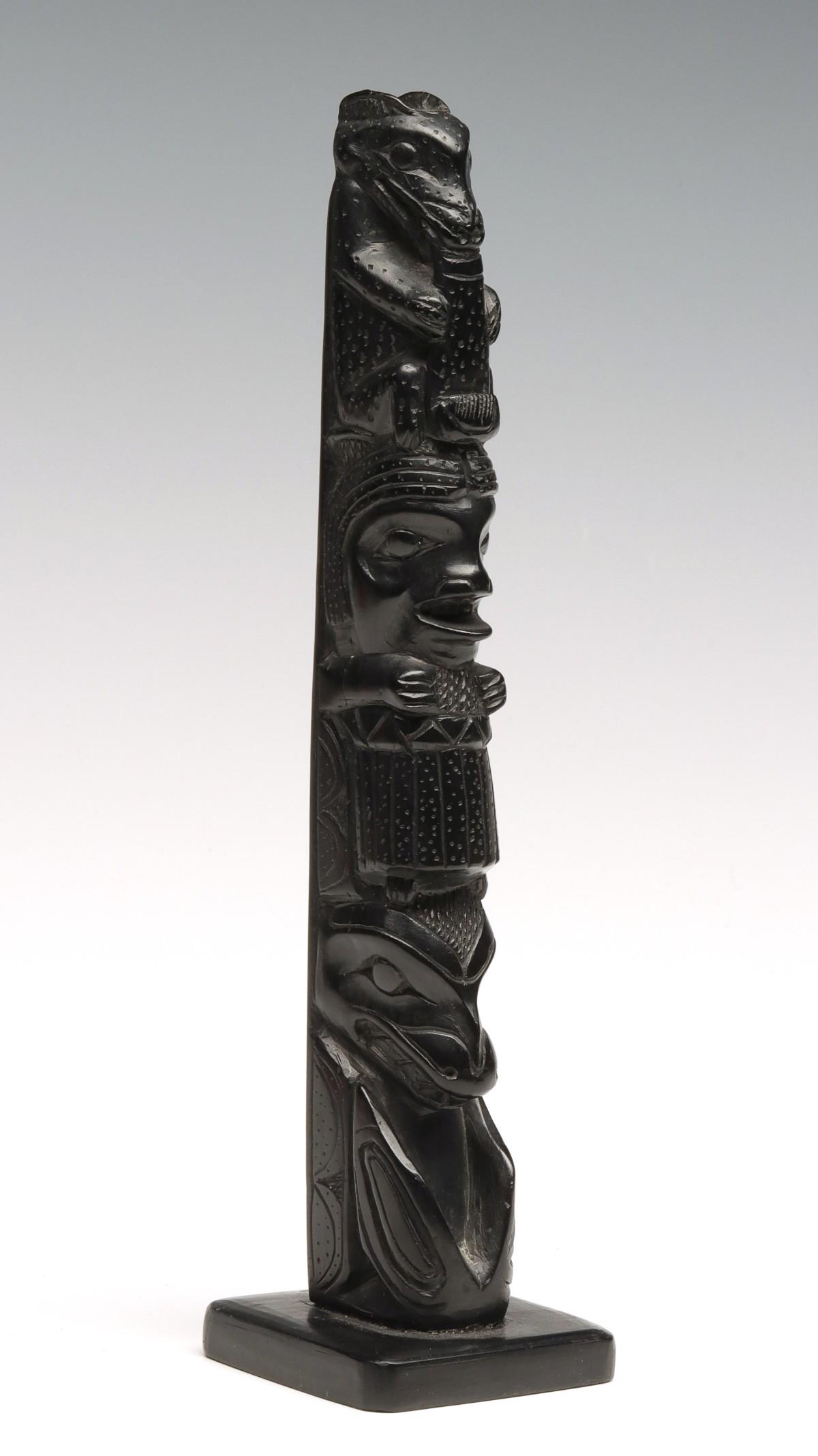 A 9-INCH NORTHWEST COAST ARGILLITE TOTEM POLE (1 of 13)