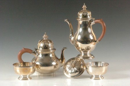 4 PC. BIRMINGHAM STERLING SILVER COFFEE & TEA SET: Fully hallmarked with maker's mark for Adie Brothers Ltd., Birmingham, sterling, date mark of 1949. Measures from 10.5 x 8.5 to 2.75 x 4.25 inches, total weight of 66.6 troy oz.
