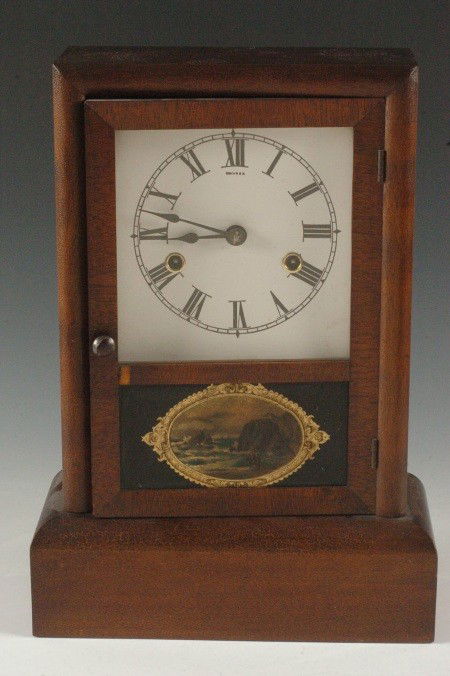 A SETH THOMAS COTTAGE CLOCK: 14.5 x 10 inches.