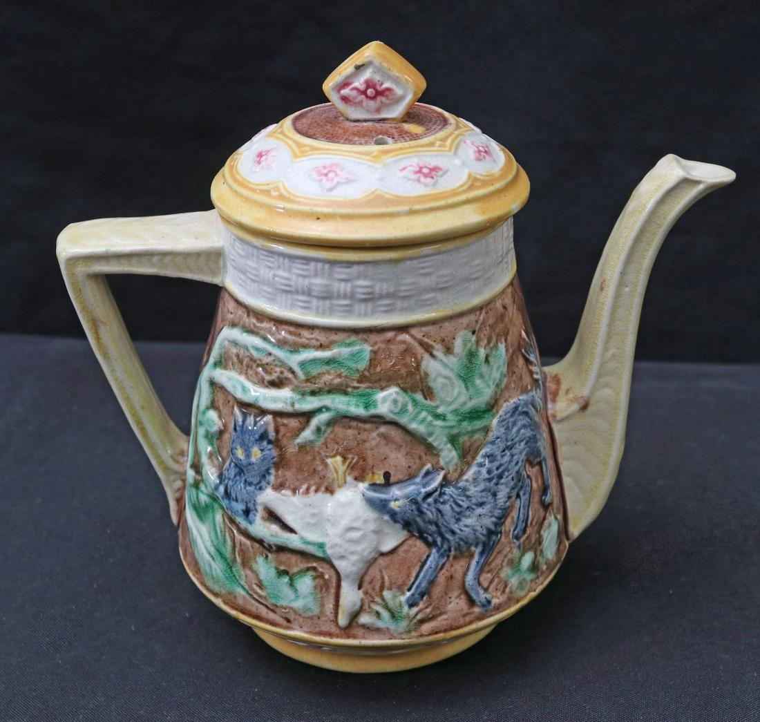 A SCARCE MAJOLICA TEAPOT WITH WOLF AND GOOSE (1 of 3)