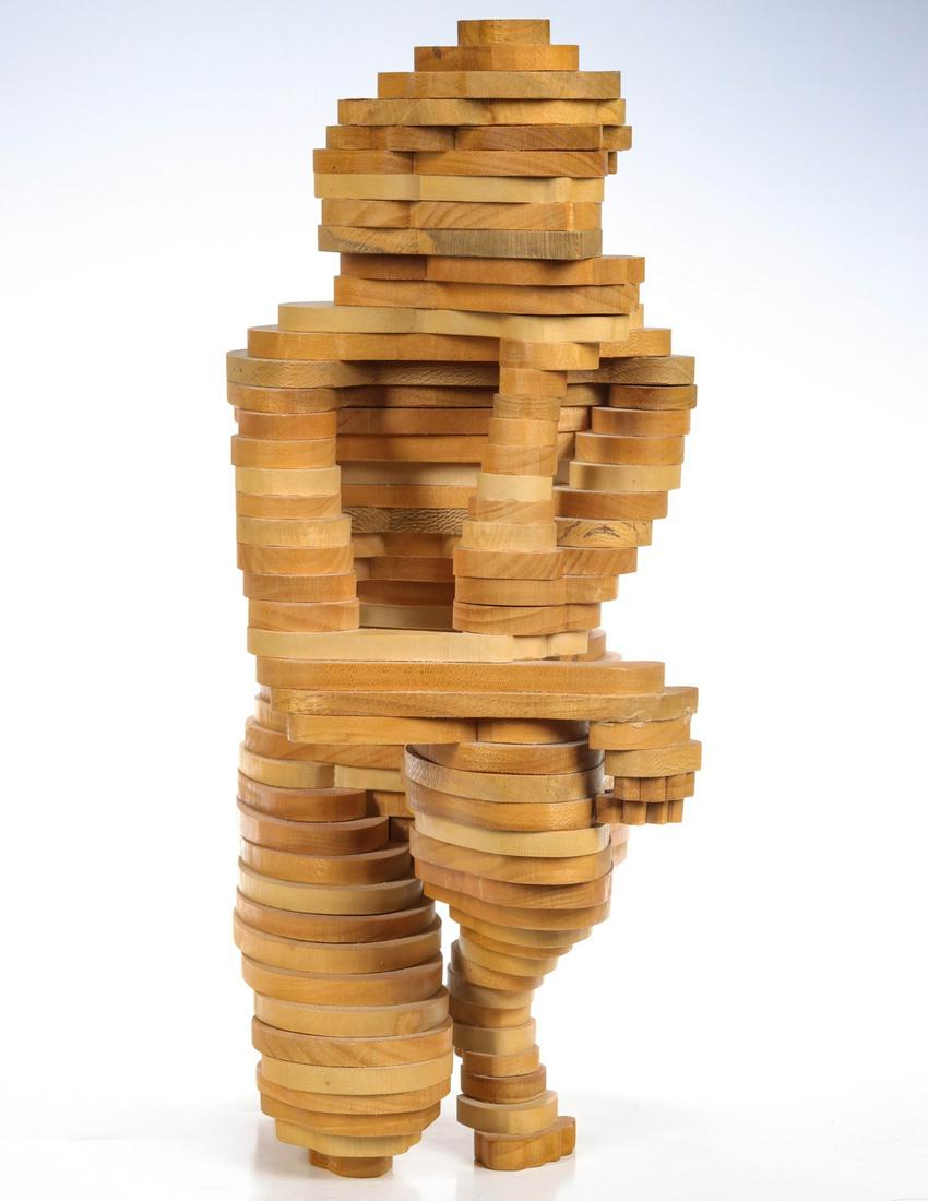 REUBEN KAROL (1922-2022) WOOD CONTOUR CUBIST SCULPTURE: Reuben H. Karol (1922-2020) Patience Circa 1997. The contemplative nude figure in a unique deconstructed style of joined wood layers is the product of a retired civil engineer's fascination with figur