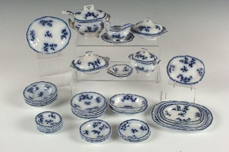 A RARE AND EXCEPTIONAL CHILDS FLOW BLUE CHINA SET: An incredible extant service that includes a footed tureen on under plate with old repair at rim, otherwise in very good condition, measures 4.75 x 5.50 inches, two covered casseroles each measuring 2