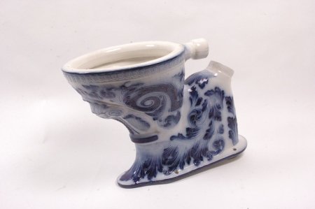 RARE DOULTON FLOW BLUE TOILET: Marked in the bowl Doulton & Company London, Lambeth & Paisley, 'Simplicitas'. Measures 17 x 13.5 x 23 inches.