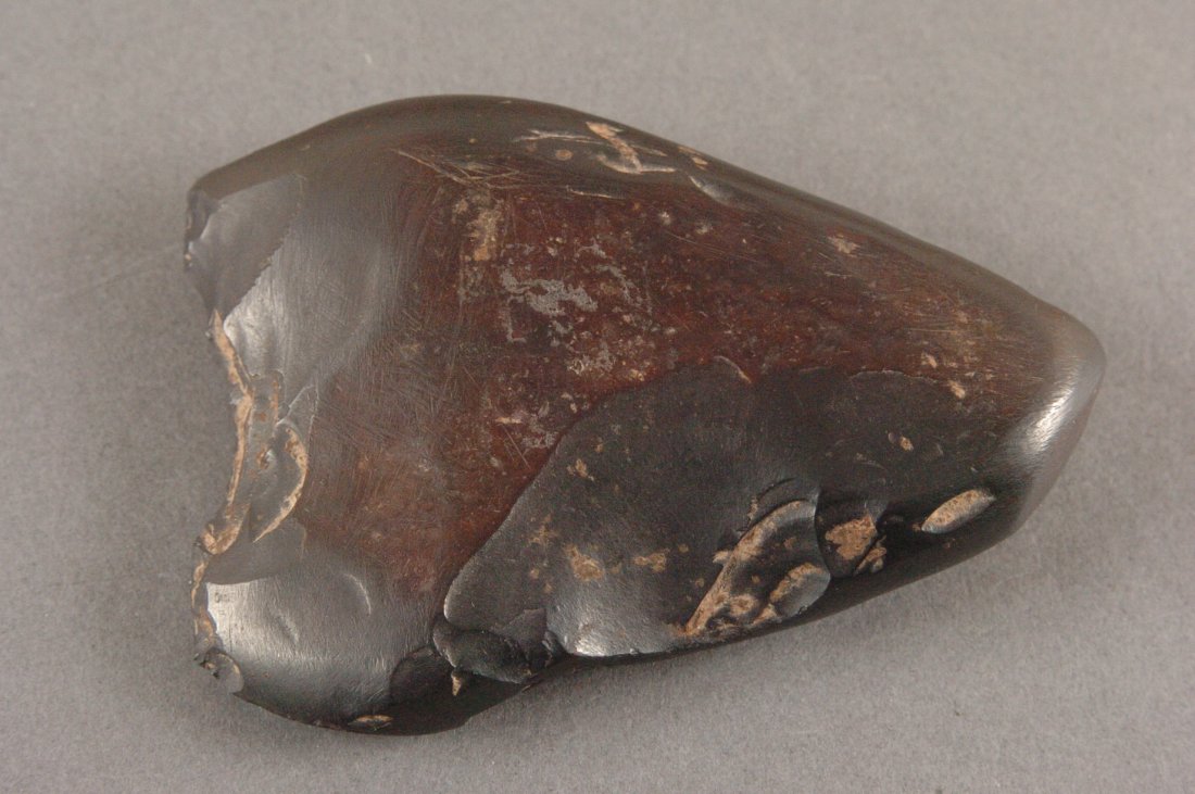 3.5 INCH HEMATITE AXE: 3.5 x 2.5 inches.